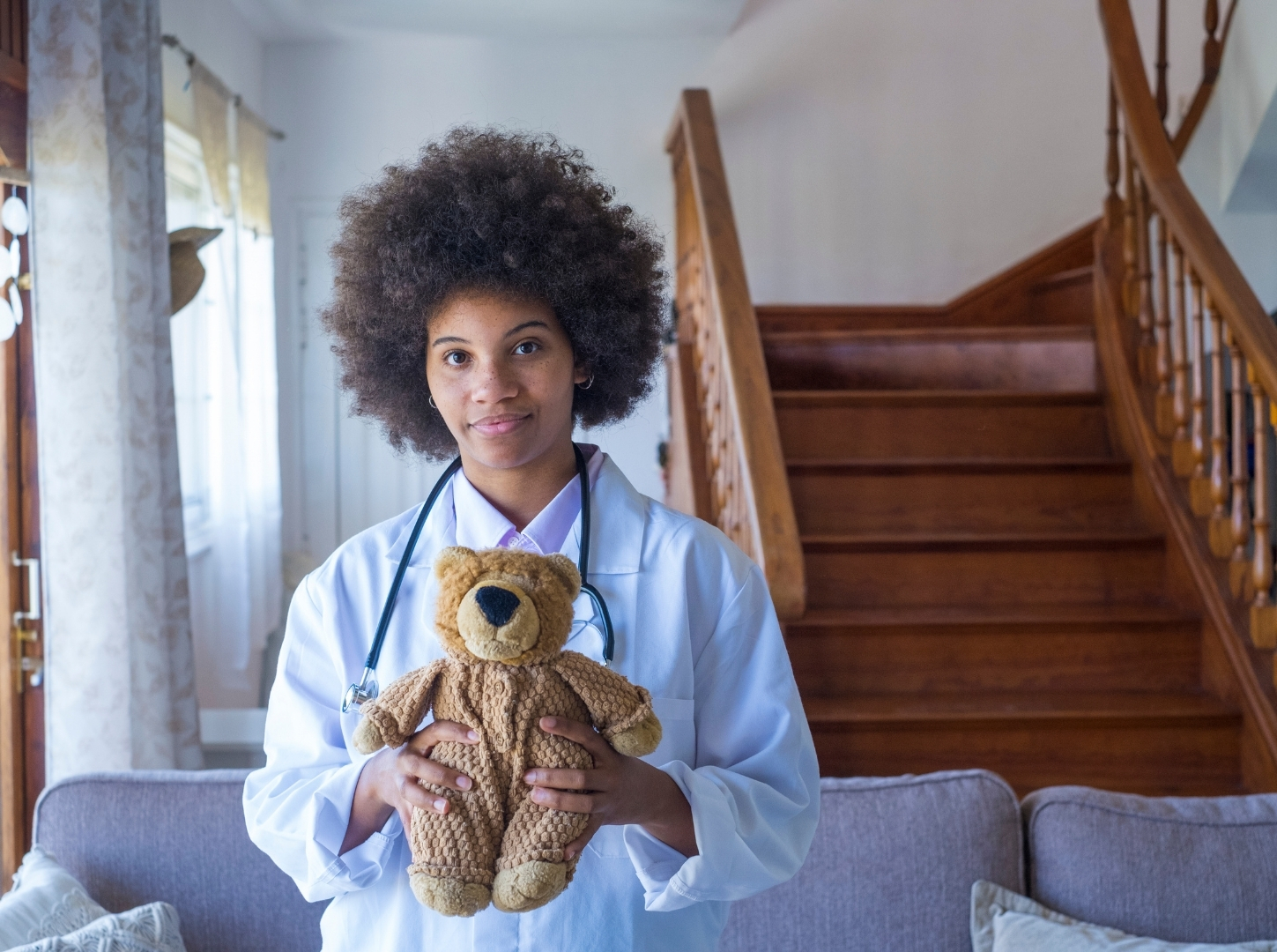 Portrait of Young African American Female Nurse in Medical Uniform