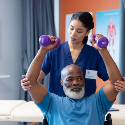 diverse-female-physiotherapist-helping-senior-male _ Rehabilitation Services